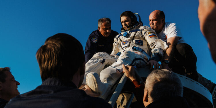 Russian Soyuz brings crew of three back from International Space Station