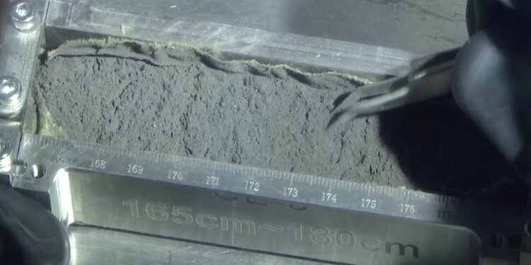 Chang’e-6 lunar samples make public debut, lighter in color compared with previous mission