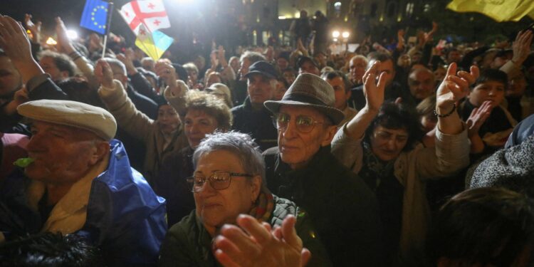 Georgian opposition calls for more protests as exit pollster says official result ‘impossible’