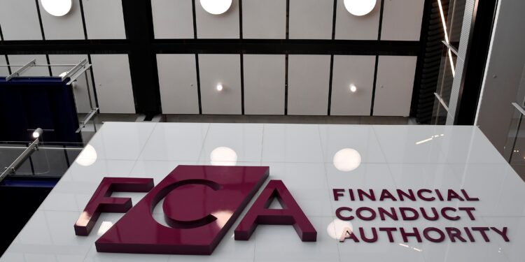 Two men charged with insider dealing in Britain