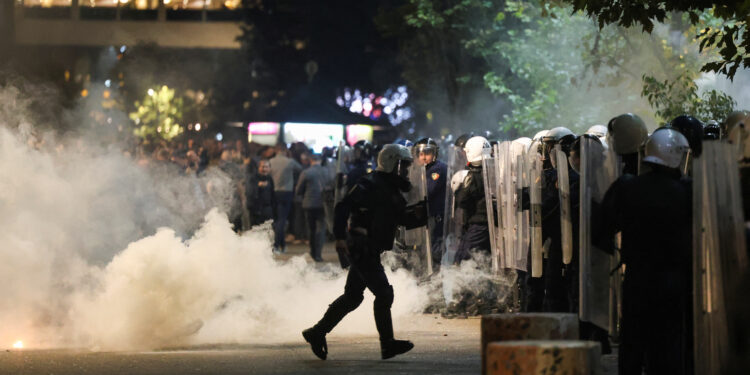 Albania’s police fire teargas to disperse protesters hurling petrol bombs
