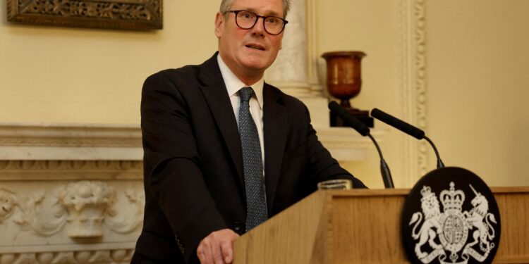 Britain outlines details of closely watched workers’ rights plan