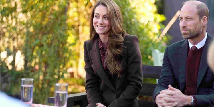 Princess Kate joins husband William on visit to town hit by killings, riot