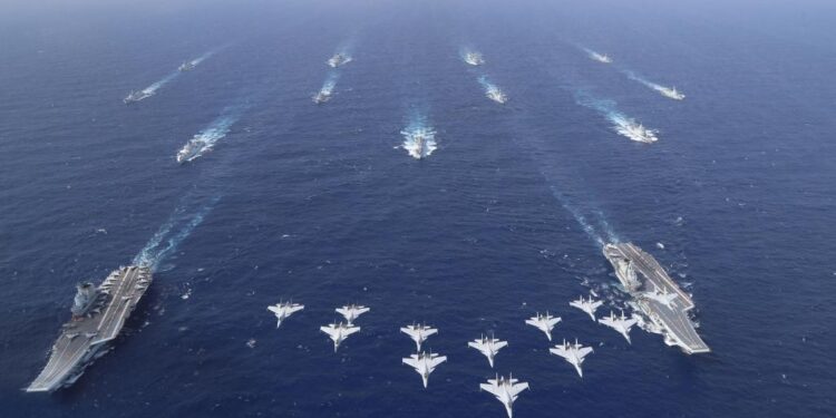 Chinese navy conducts dual aircraft carrier formation exercise for first time