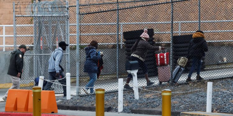 Trump steps up immigration crackdown, warns city, state officials against interference