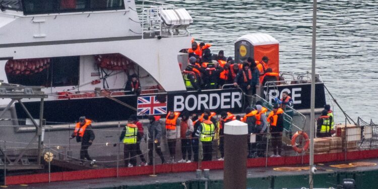 Britain plans new sanctions laws to target people-smuggling gangs