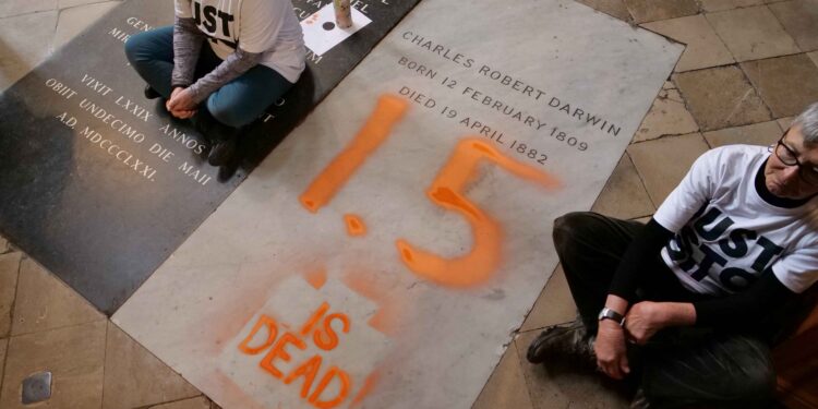 Climate activists deface Darwin’s grave at London’s Westminster Abbey