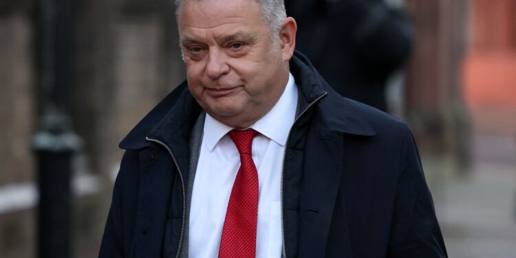 British lawmaker Amesbury pleads guilty to assault after punching passerby