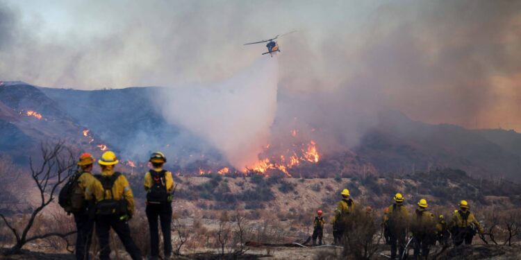 New wildfire near Los Angeles explodes to 9,400 acres, forces evacuations
