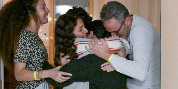 Cheers and weeping as Israelis watch Gaza hostages return