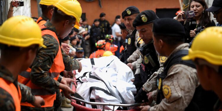 At least 50 die in Guatemala after bus plunges off bridge