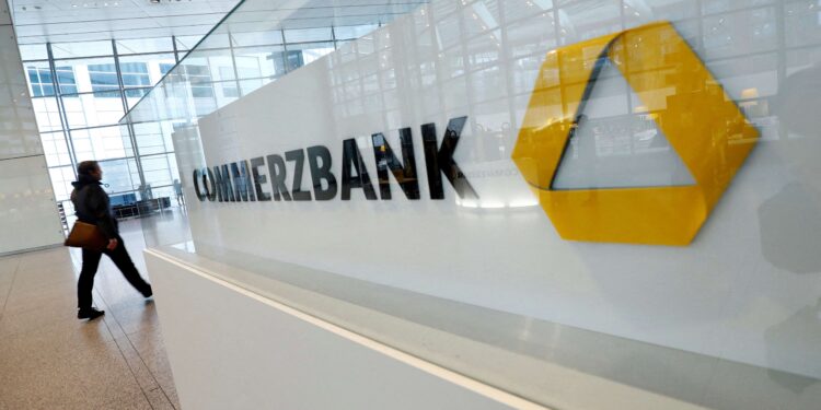 Commerzbank plans job cuts, new targets to keep UniCredit away, sources say