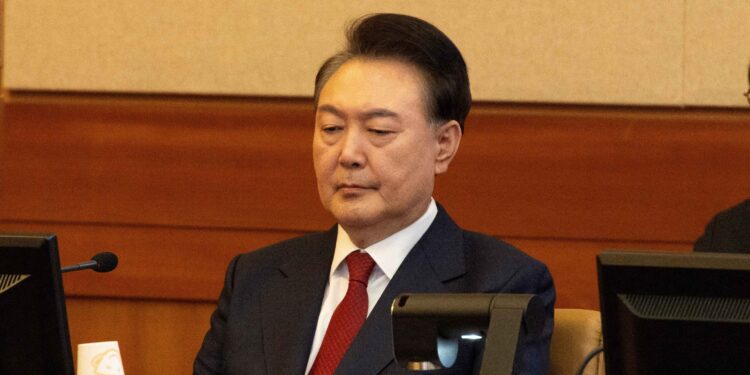 South Korea’s Yoon set to attend his first criminal trial hearing
