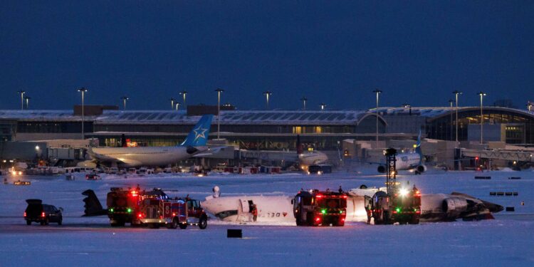 Delta plane flips upside down on landing at Toronto airport, injuring 18