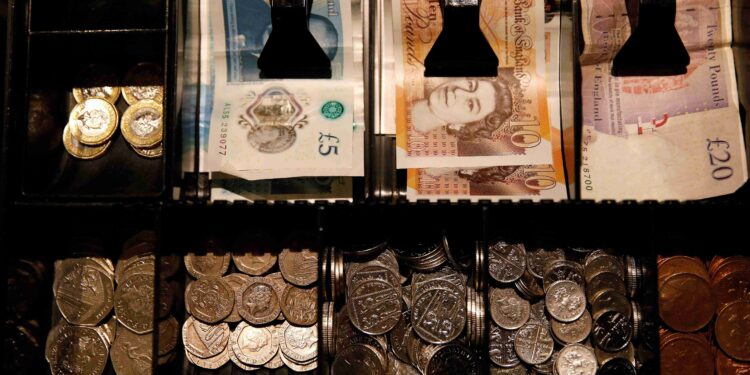 Sterling edges up after UK data shows jump in food inflation