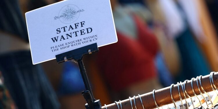 UK jobs surveys send fresh cool-down signals