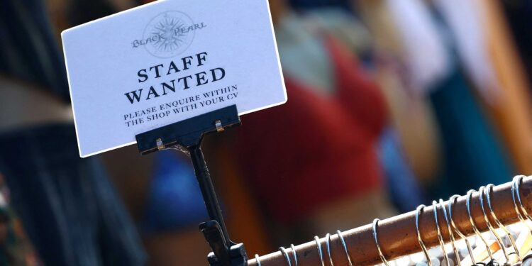 UK jobs surveys send fresh cool-down signals