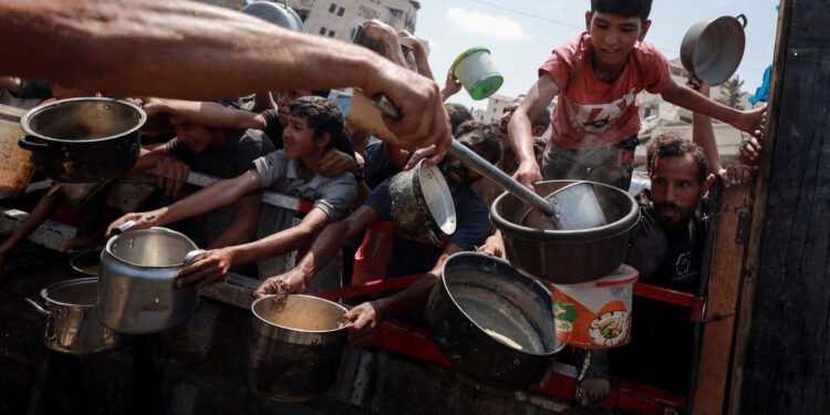 Britain warns Israel it could recognise Palestinian state as Gaza starvation spreads