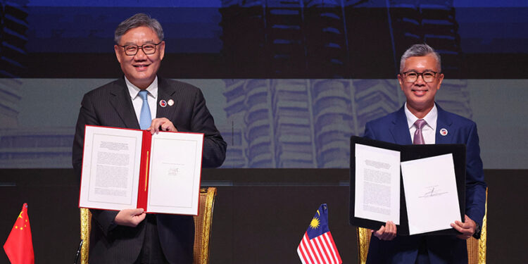 China and ASEAN, hit by US tariffs, sign upgraded free trade pact