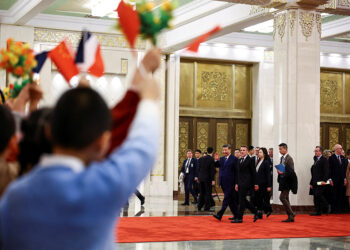 Macron urges Xi to step up efforts on Ukraine, rebalancing global trade