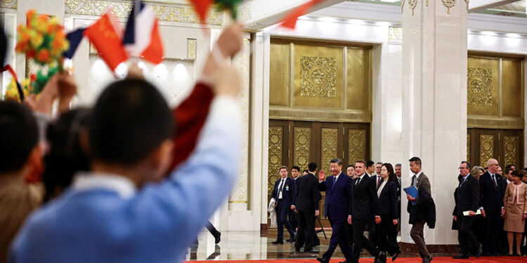 Macron urges Xi to step up efforts on Ukraine, rebalancing global trade