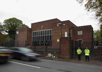 UK police charge 31-year-old man linked to Manchester synagogue attacker