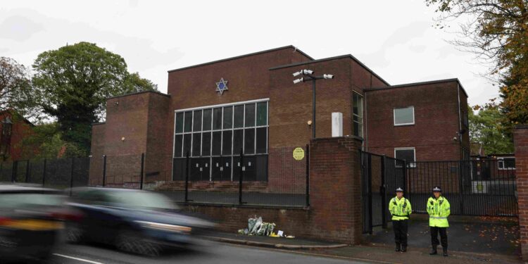 UK police charge 31-year-old man linked to Manchester synagogue attacker