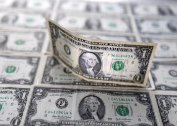 Dollar hovers near five-week low on Fed rate cut bets