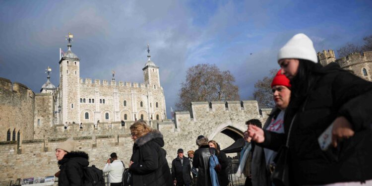 Four arrested at Tower of London after apple crumble and custard thrown at State Crown display