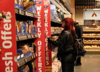 UK shoppers cut Christmas costs by buying early and dining in, says Aldi