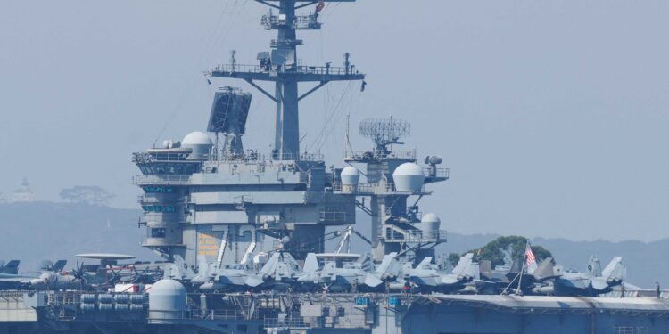 US shoots down Iranian drone approaching aircraft carrier, official says