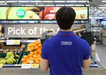 Britain’s Tesco boosts hourly pay to 13.28 pounds