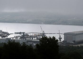 Iranian man, Romanian woman charged over attempt to enter UK submarine base