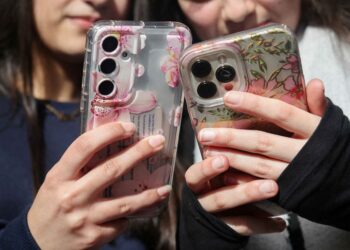 Britain pilots social media bans, time limits and curfews for children