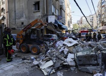 Israel pounds Beirut suburbs after Hezbollah fires volley of rockets