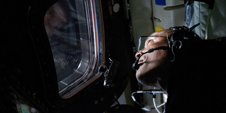 Circling the moon, a Black astronaut inspires millions
