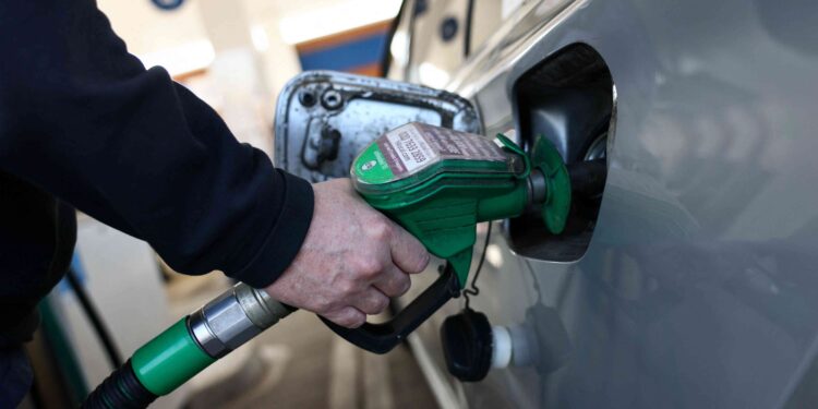 Rising fuel prices weigh on UK consumers, surveys show