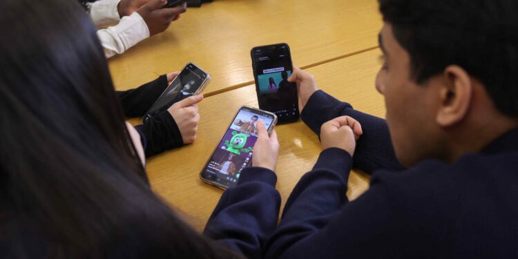 Social media as bad for children as smoking, British doctors say