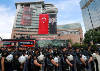 Turkish police force ousted opposition out of headquarters as crisis deepens