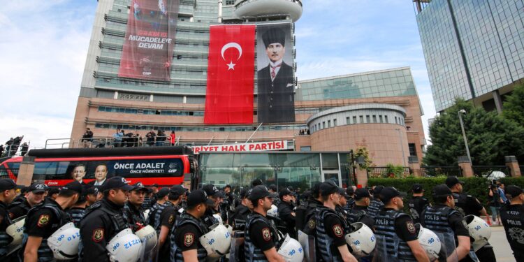 Turkish police force ousted opposition out of headquarters as crisis deepens