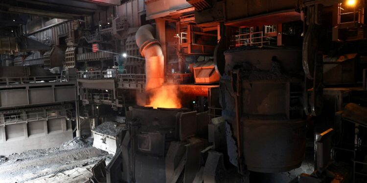Euro zone factory growth slowed in May as input costs hit four-year high, PMI shows