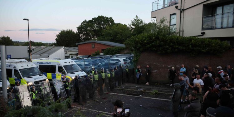 UK police under pressure after dying student was handcuffed