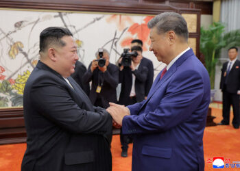 Flags, gun salute greet China’s Xi on arrival in North Korea for summit