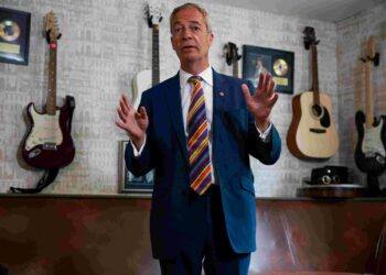 Bank of England warns of scams after fake video shows brawl with Reform UK’s Farage