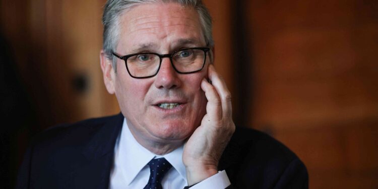 Urged to consider his position, Starmer warns against UK leadership challenge