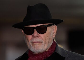 Former UK pop star Gary Glitter charged with non-recent sexual offences