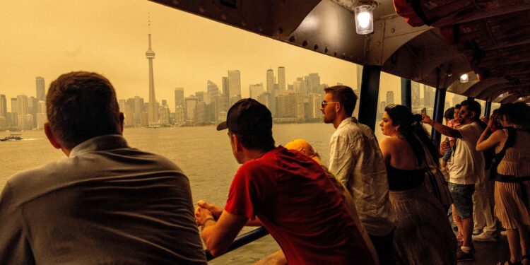 Ontario seeks federal support for evacuations as wildfires devastate remote Canadian towns