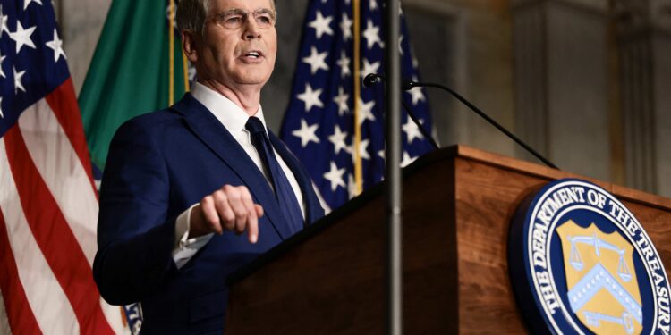 US threatens countries doing business with Iran, but holds off on penalties for now