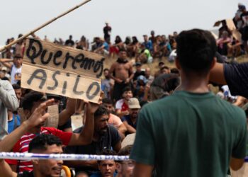 In Spain’s Ceuta, hundreds of migrants stage protest and demand asylum