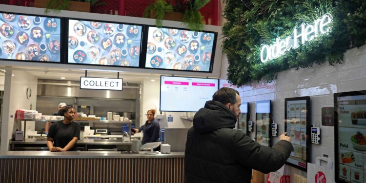 UK services sector returns to growth, optimism picks up, PMI shows